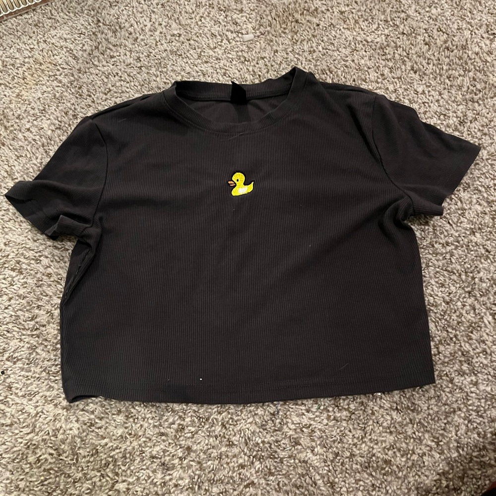 Gray top with a yellow duck in the middle